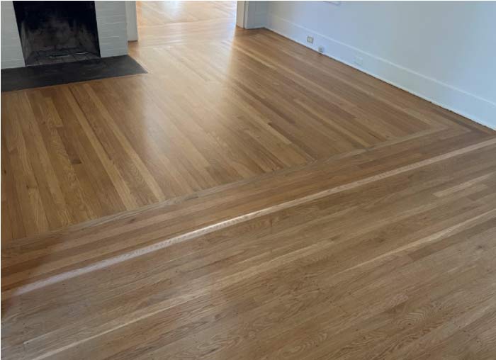 Professional installation of durable engineered hardwood over a concrete slab, demonstrating essential subfloor preparation steps.