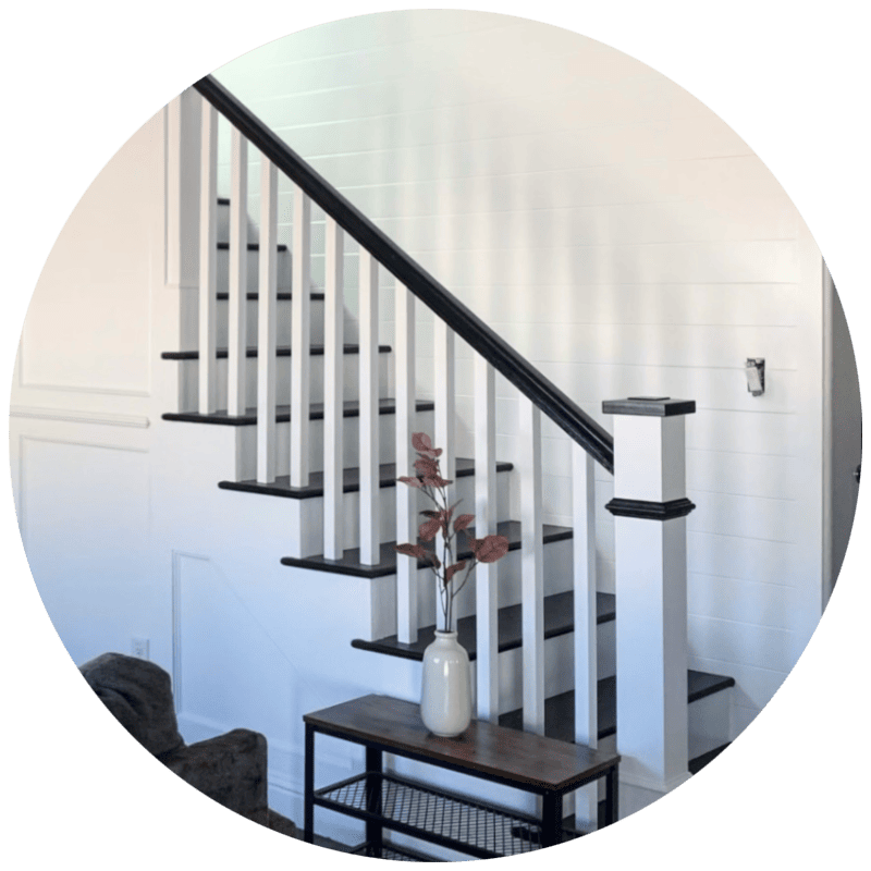 staircase flooring Installation - Black and white painted staircase