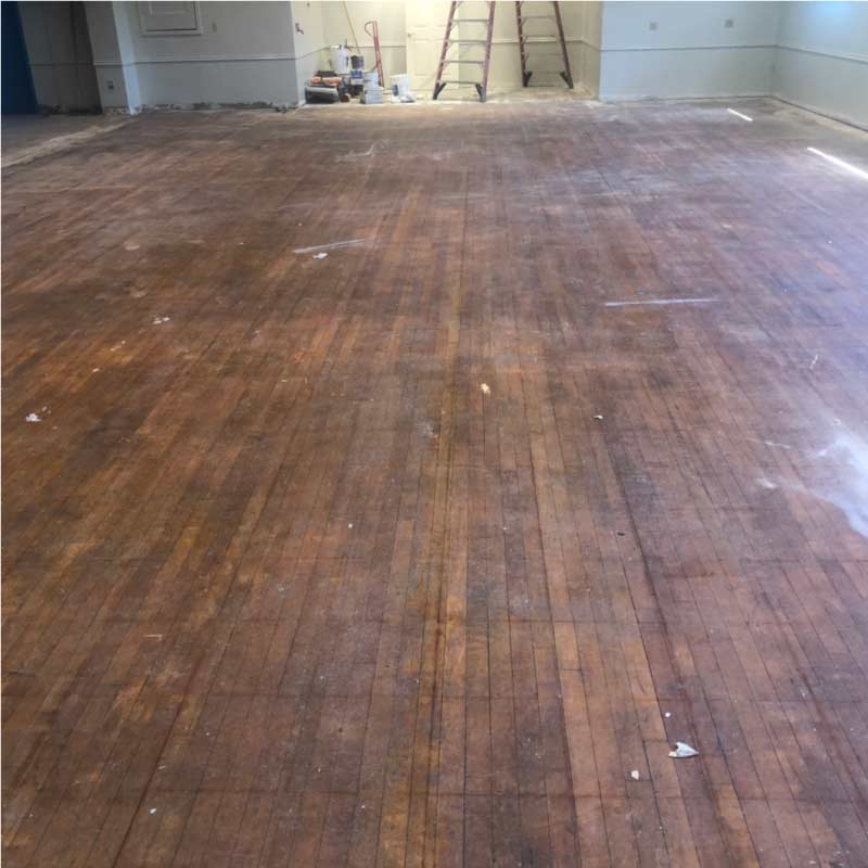 A blank canvas ready for transformation. Beautiful maple floors await their final coat