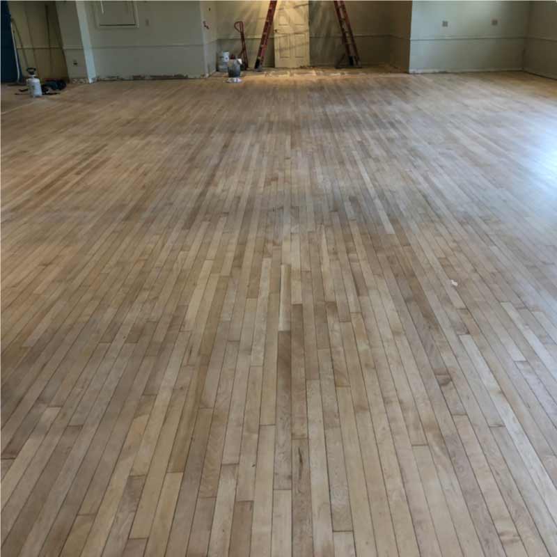 A blank canvas ready for transformation. Beautiful maple floors await their final coat